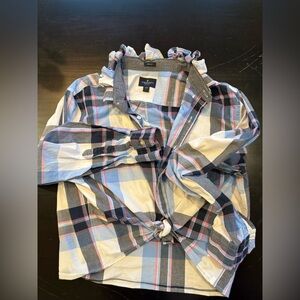 One of a kind of cycled dress shirt with ruffle collar.